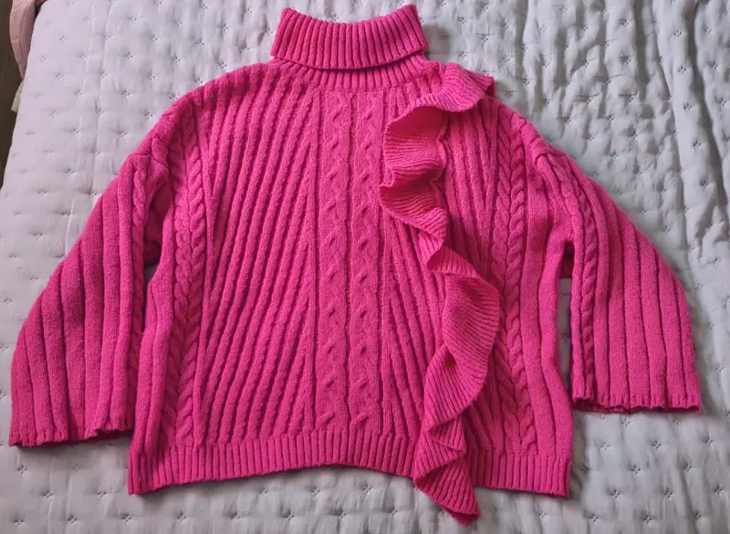 Suéter rosa con volantes para mujer