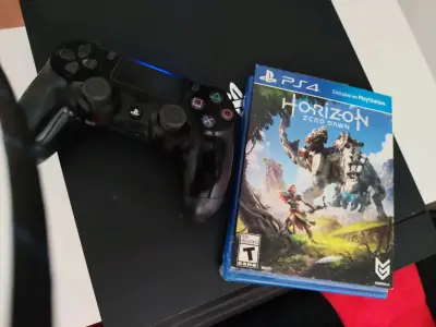 Consola PS4 con Control y Juego Horizon Zero Dawn - miniatura 1