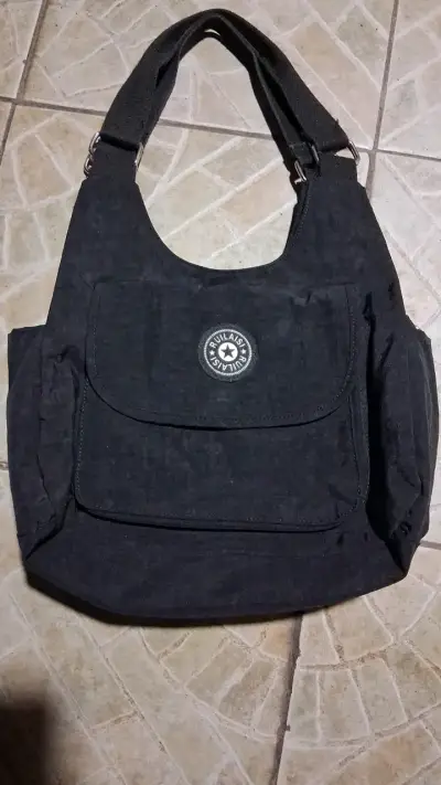 Bolso negro casual con múltiples bolsillos - miniatura 1