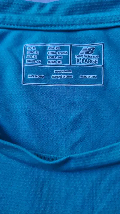 Polera deportiva azul New Balance para mujer - miniatura 2