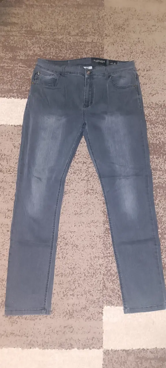 Jeans grises para hombre talla 34