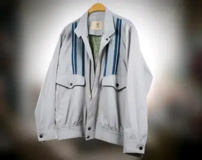 Chaqueta vintage gris con detalles azules - miniatura 1