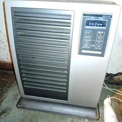 Calefactor a queroseno Toyotomi  control program - miniatura 1
