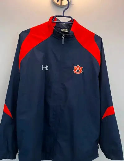 Chaqueta deportiva Under Armour azul y roja - miniatura 1