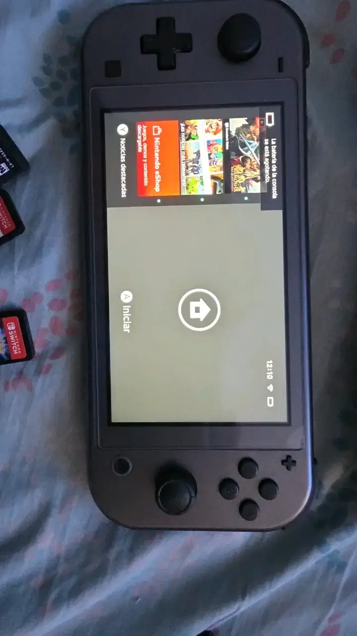Consola Nintendo Switch Lite con juegos y accesorios - 3