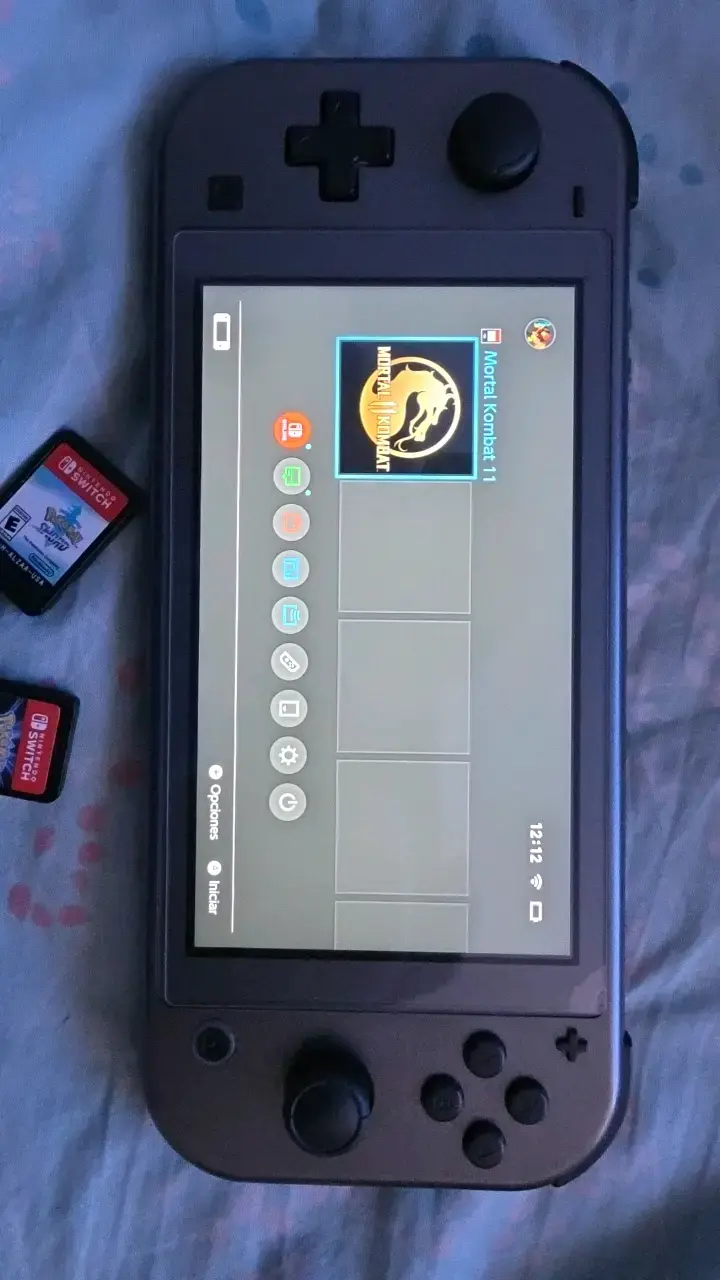 Consola Nintendo Switch Lite con juegos y accesorios - 5