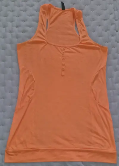 Polera sin mangas naranja para mujer - miniatura 1