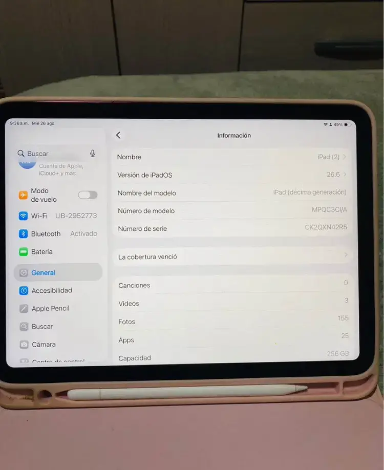 iPad rosa con Apple Pencil y cargador - 5