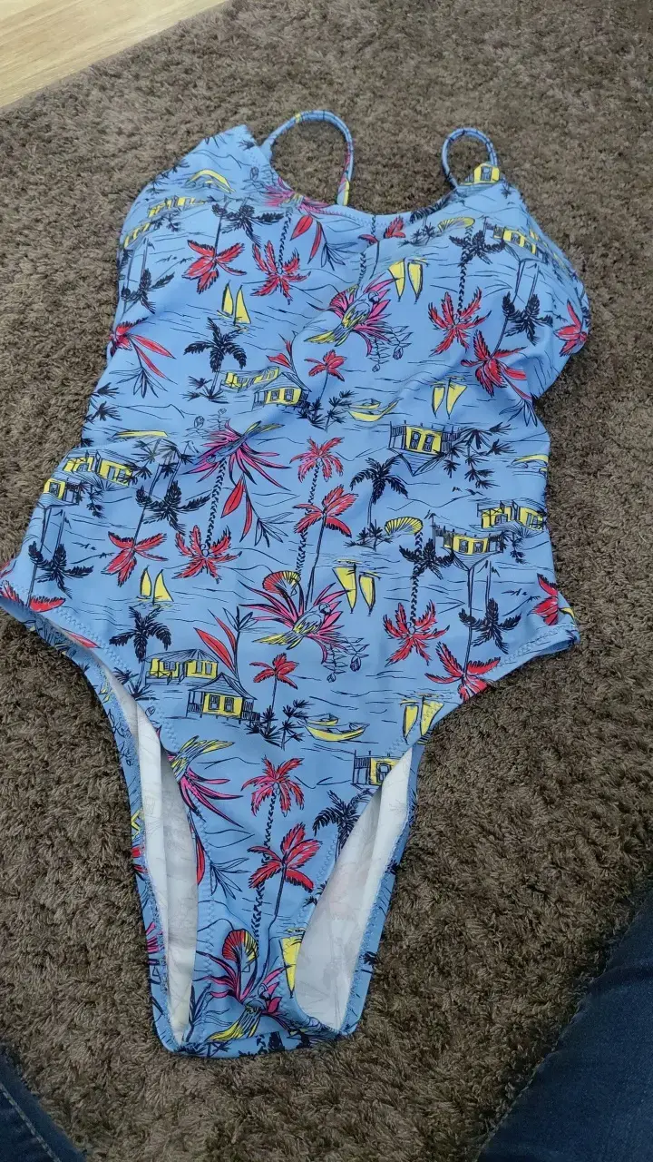 Traje de baño entero estampado tropical azul