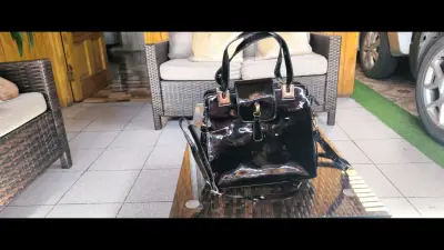 Cartera achorolada color negro - miniatura 1
