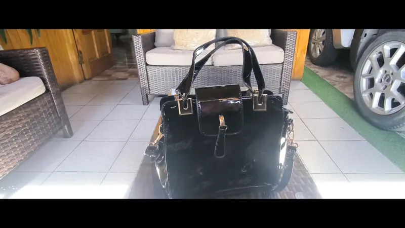 Cartera achorolada color negro - 2