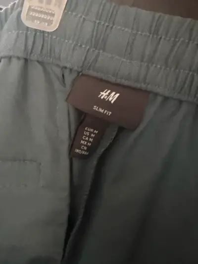 Pantalones verdes H&M Slim Fit para hombre - miniatura 3