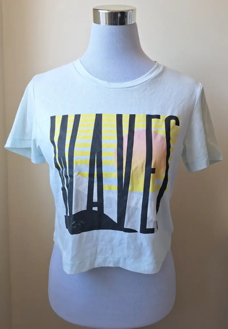 Polera celeste con estampado Mujer