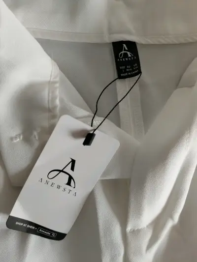 Pantalones blancos hueso de vestir Anewsta talla L - miniatura 1