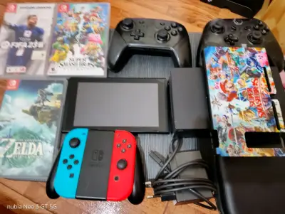 Consola Nintendo Switch con juegos y accesorios - miniatura 1