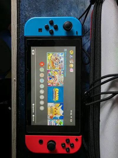 Consola Nintendo Switch con accesorios y juegos - miniatura 1