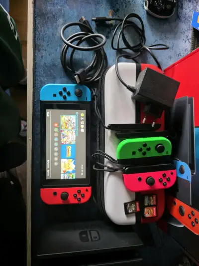 Consola Nintendo Switch con accesorios y juegos - miniatura 3