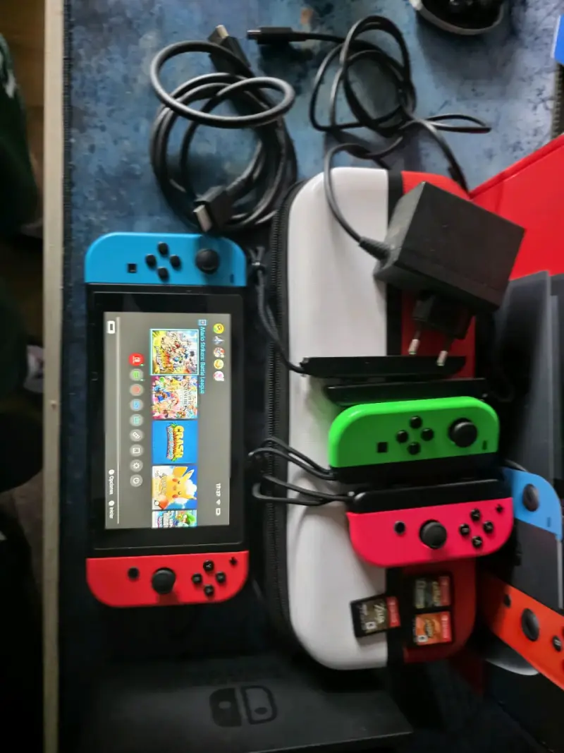 Consola Nintendo Switch con accesorios y juegos - 4