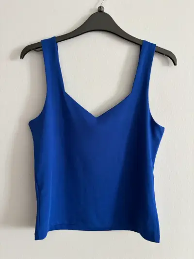 Polera azul sin mangas - miniatura 1