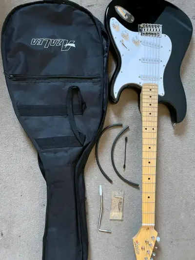 Guitarra eléctrica Zalea negra con funda y accesorios - miniatura 1