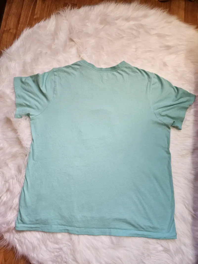 Polera Nike verde agua con diseño gráfico - 2