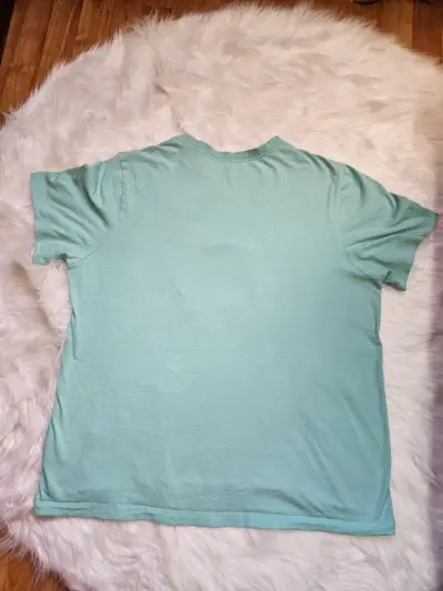 Polera Nike verde agua con diseño gráfico - miniatura 2