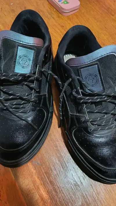 Zapatillas negras de cuero para hombre - miniatura 1