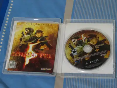 Resident Evil 5 Gold Edition para PS3 usado - miniatura 2