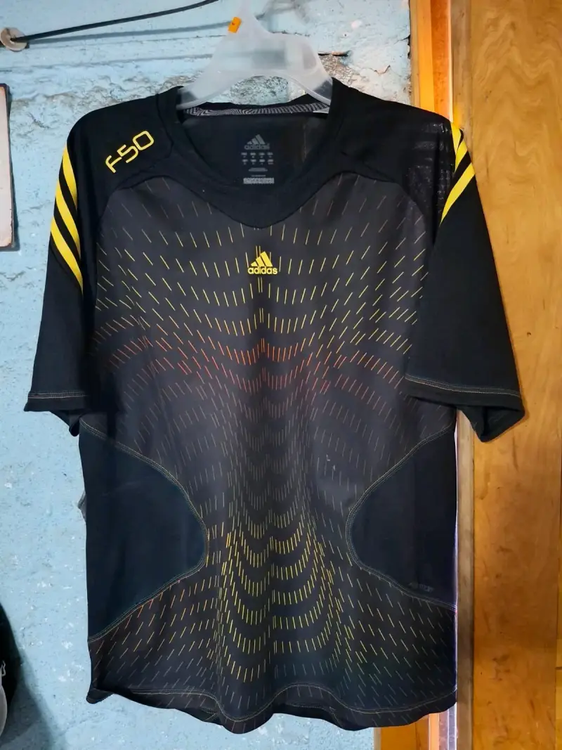 Polera deportiva Adidas F50 negra y amarilla - 1