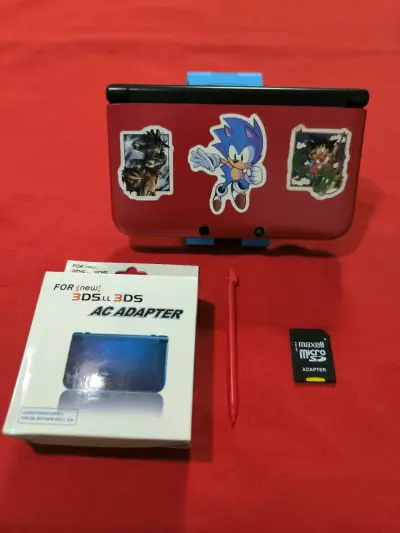 Nintendo 3DS XL Roja con Negro + 32GB + 14 Juegos - miniatura 1