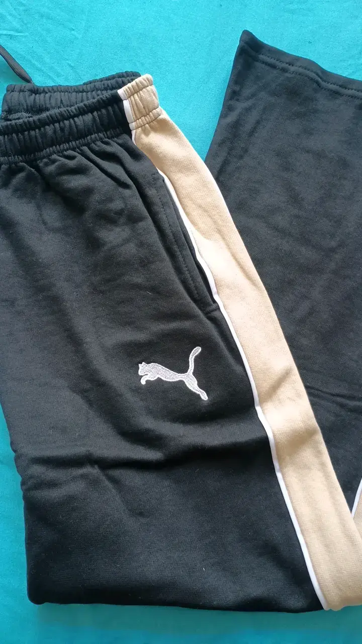 Conjunto deportivo negro y beige Puma para hombre