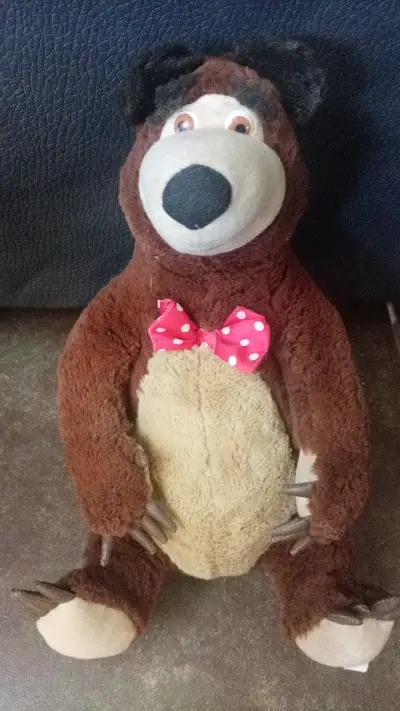 Peluche de oso marrón con moño rojo - miniatura 1