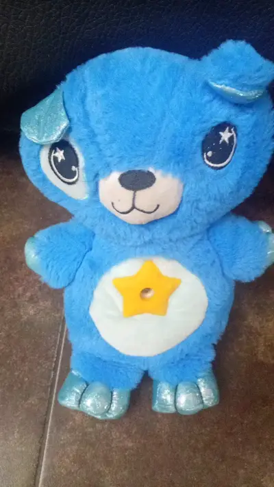 Peluche azul con estrella amarilla espanta cuco - miniatura 1