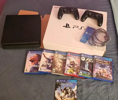 Consola PS4 con juegos y accesorios - miniatura 1