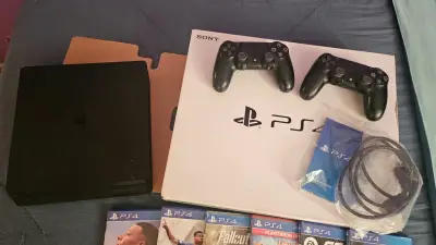 Consola PS4 con juegos y accesorios - miniatura 3