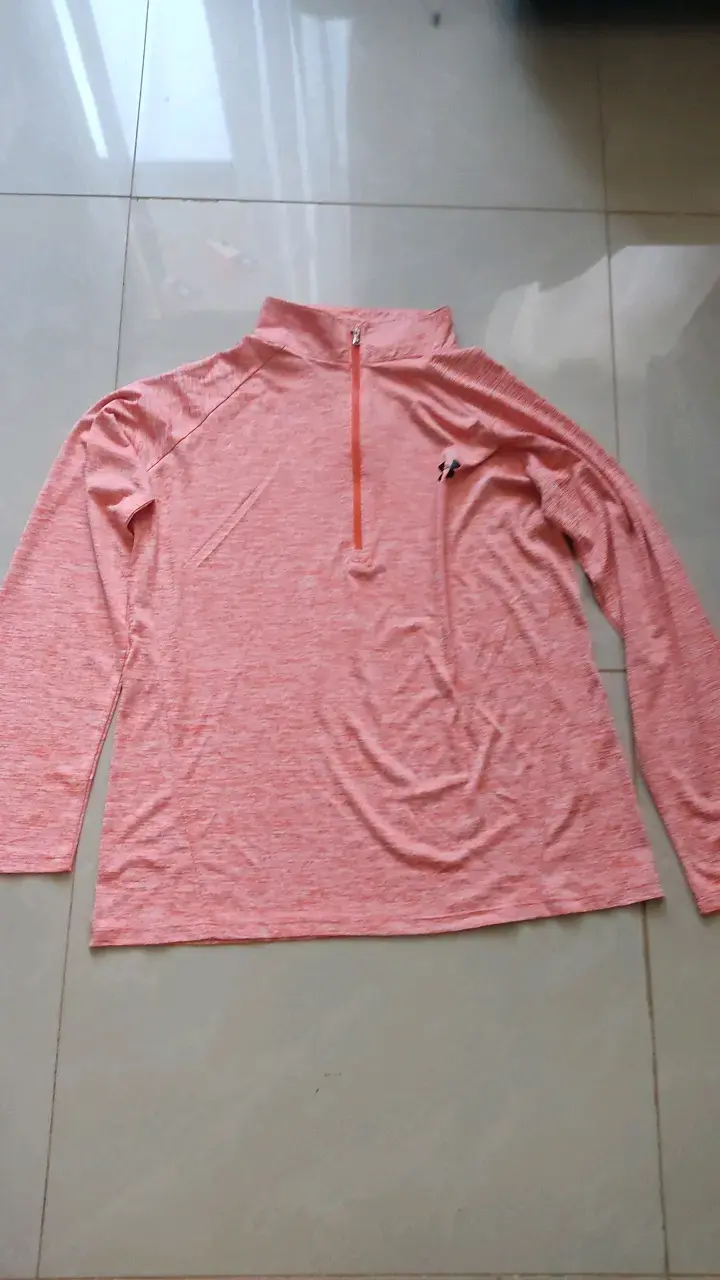 Polera deportiva Under Armour HeatGear coral - 1