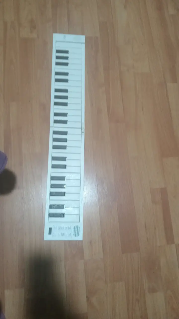 Piano plegable