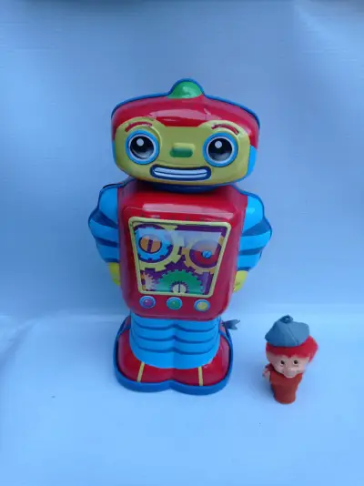 Juguete robot de lata vintage colorido - miniatura 1