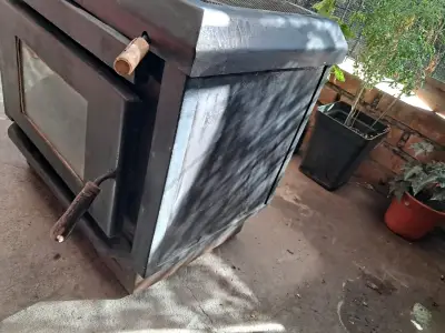 Estufa a leña de hierro fundido con puerta de vidrio - miniatura 2