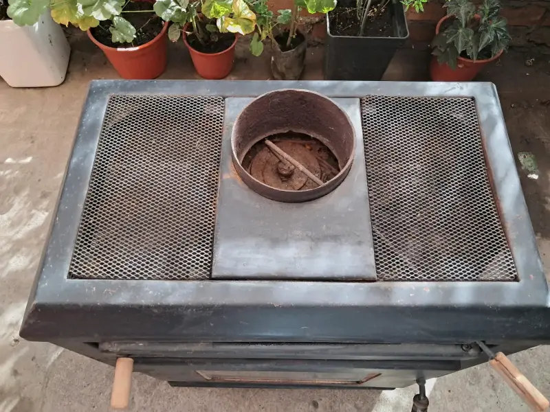Estufa a leña de hierro fundido con puerta de vidrio - 5