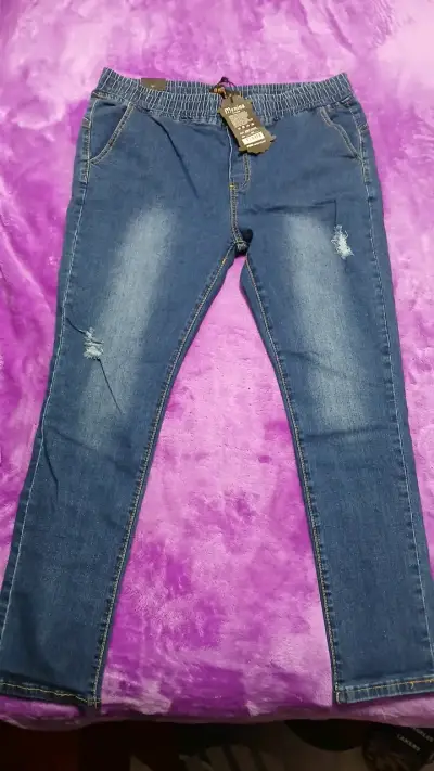 Jeans pitillo azul desgastado para mujer - miniatura 1