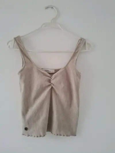 Top sin mangas beige aussie - miniatura 1