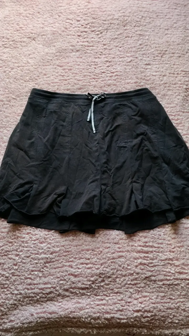 Falda negra casual con lazo ajustable - 2