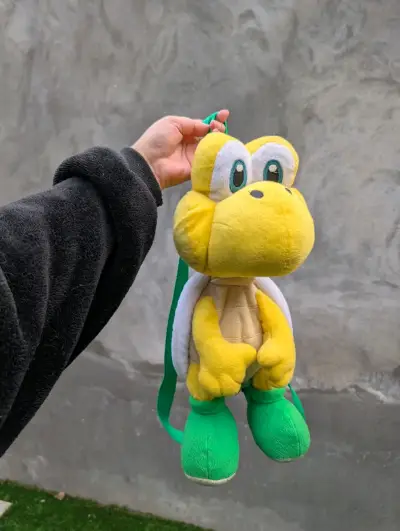 Mochila de peluche Koopa Troopa amarilla - miniatura 1