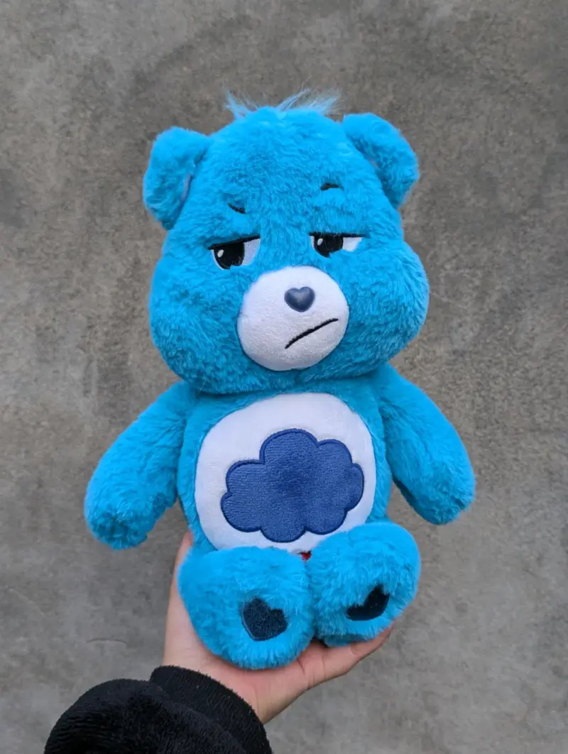 Peluche azul Care Bears Gruñoncito - 1