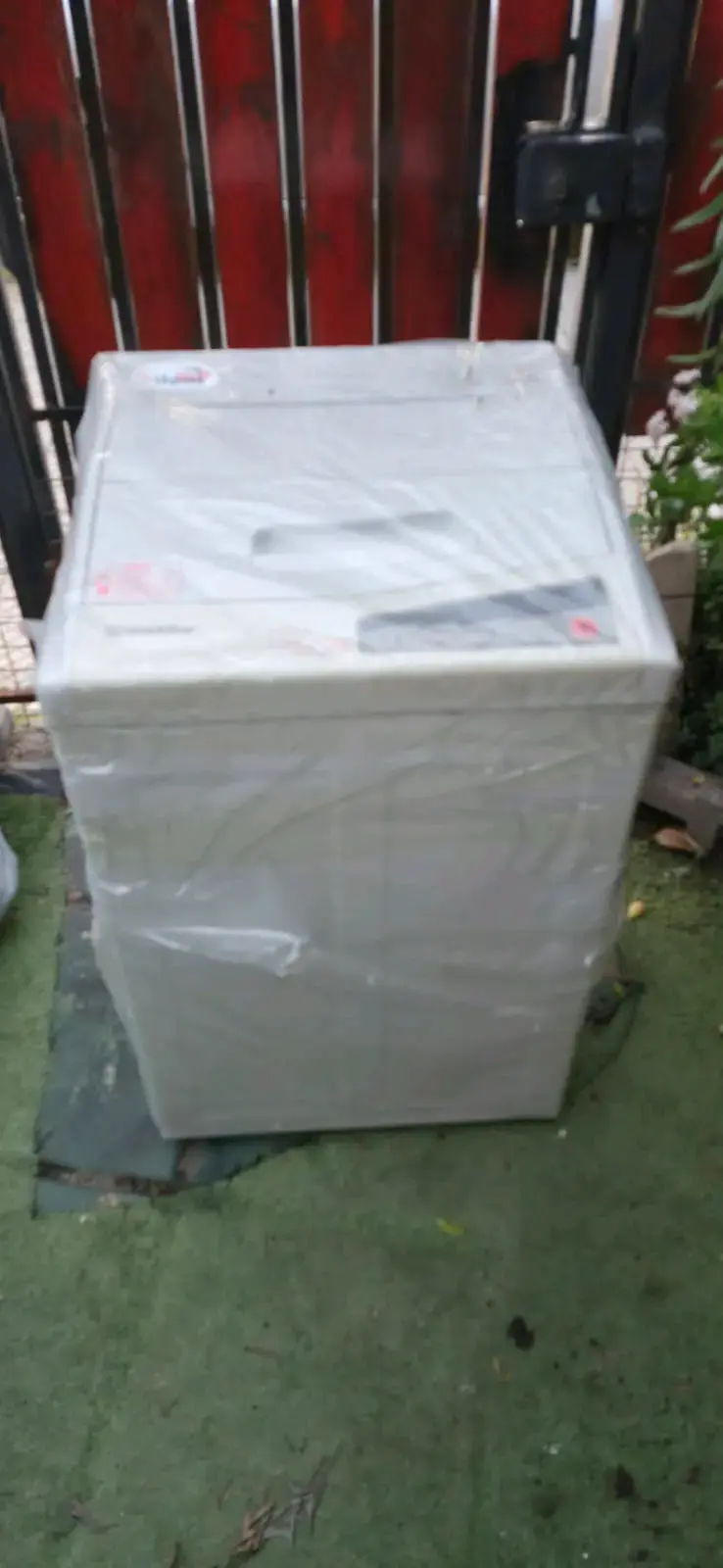 Lavadora automática Haier en buen estado