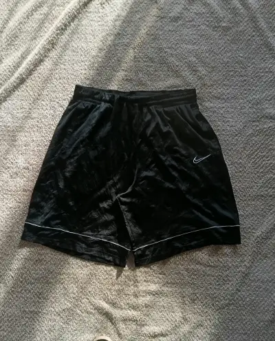 Shorts negros Nike rapper - miniatura 1