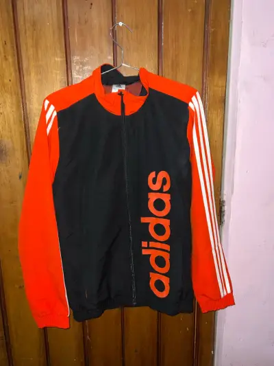 Conjunto deportivo Adidas negro y naranja - miniatura 1