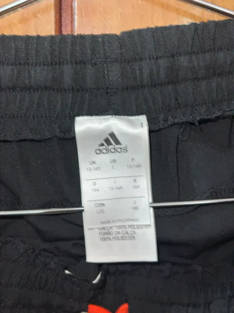 Conjunto deportivo Adidas negro y naranja - 6