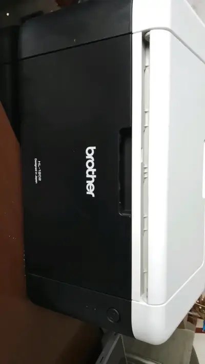 Impresora láser Brother HL-1202 en buen estado - miniatura 3